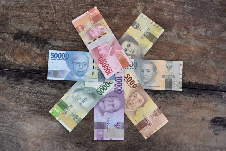 Banknotes on the Wooden Surface