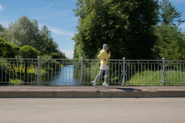 Woman Jogging on a Sidewalk