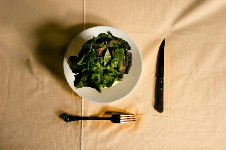 green vegetable on white ceramic bowl