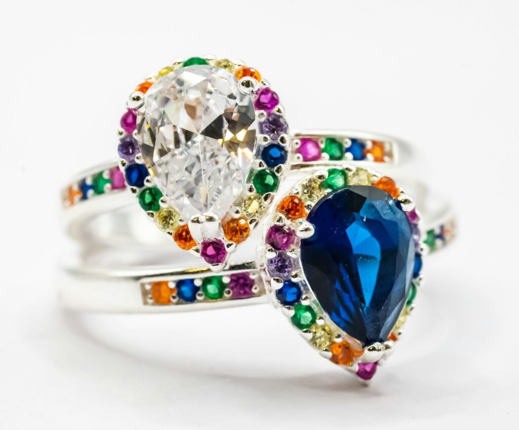 A close up of a ring on a white background