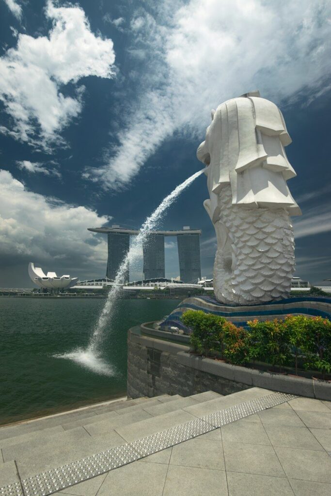 a water spouting out of the top of a statue